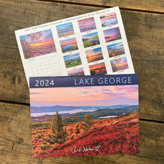 2024 wall calendar cover and back showing monthly images, each featuring a photograph of Lake George.
