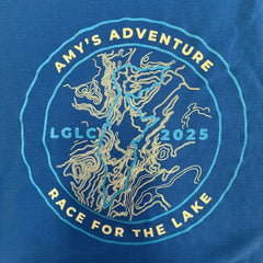Blue t-shirt with 'Amy's Adventure Race for the Lake' design featuring a map and text.