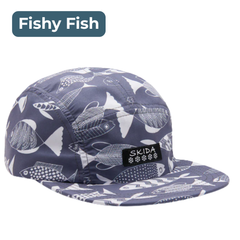 Brim hat with blue fabric patterned with white drawings of fish. Skida branding on front, labeled "Fishy Fish."